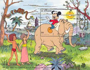 Маугли, девочка и Микки Маус на слоне